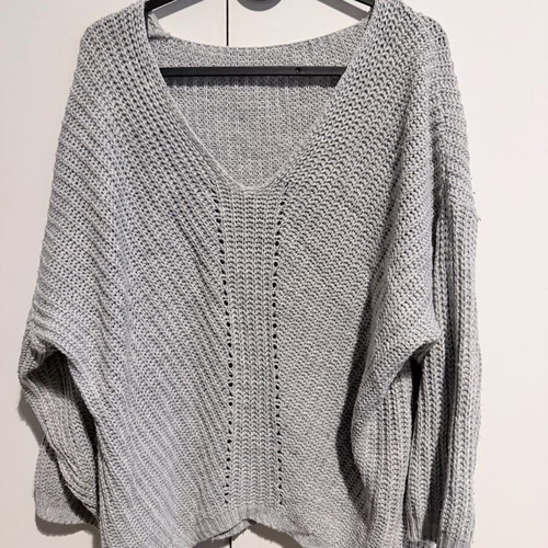 Gray sweater used, size M, with seam wear on sleeves