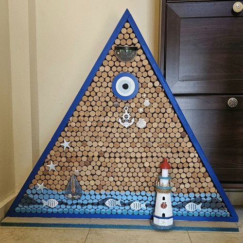 Sea-themed wall art with 600 corks and lighting