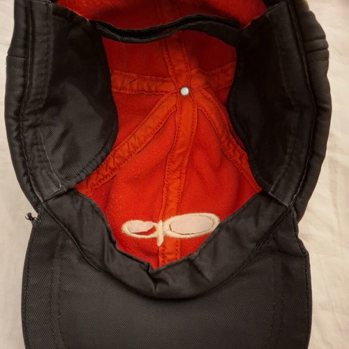Jockey hat like new with ear protection, adjustable size, black and red