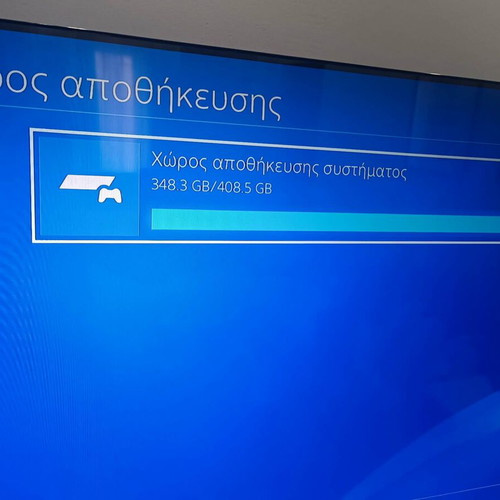 PlayStation 4 console with 2 controllers and cables