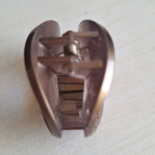 Brown hair clip with rhinestones used