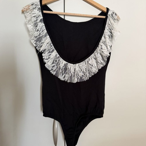 Bodysuit with lace and back opening one size like new, black and white