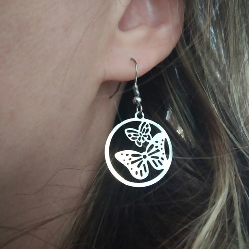 Butterfly earrings new with metal detail and steel hook