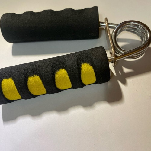 Fitness hand gripper like new, yellow and black