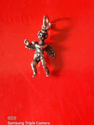 Silver pendant Eros like new
