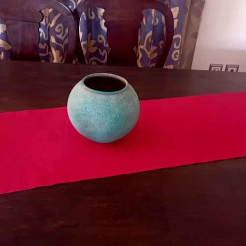 Clay vase round shape in blue-green shade like new