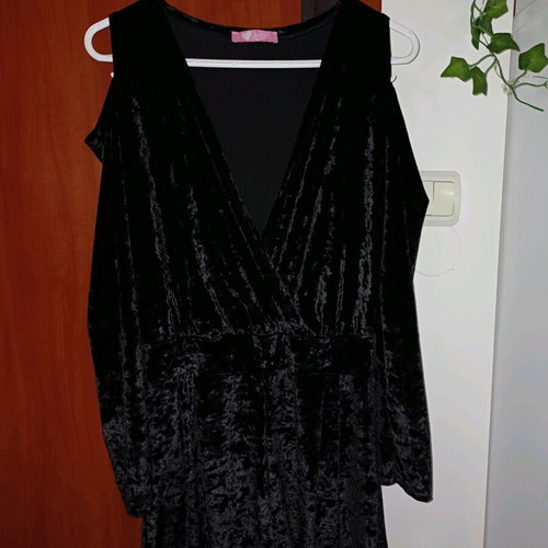 Black velvet jumpsuit like new with deep neckline and off-shoulder design