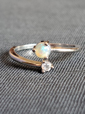 Silver ring with white opal and clear zircon, new