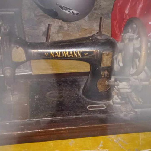 Naumann Hand Sewing Machine used on wooden antique base