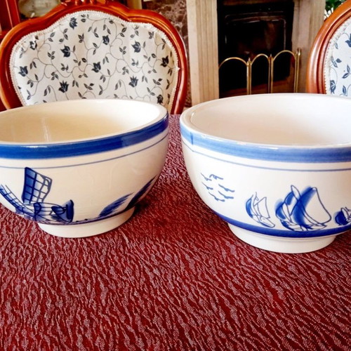Two flower pots with blue designs
