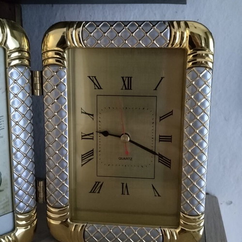 Photo frame and clock set like new with folding design