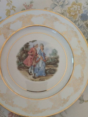 Porcelain plate vintage used with some paint loss
