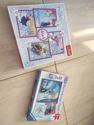Frozen puzzle set like new with Ravensburger and Trefl