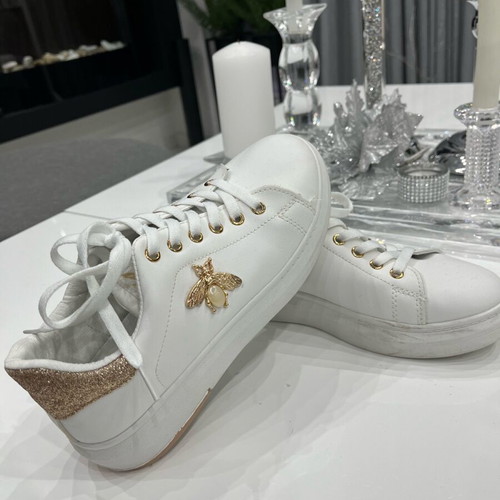 Women's athletic shoes used, white with gold details, size 39