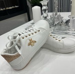 Women's athletic shoes used, white with gold details, size 39