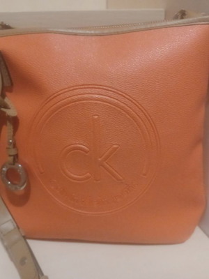 Calvin Klein crossbody bag used, light orange color