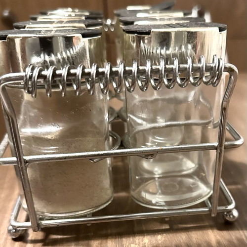 Vintage spice set with metal rack and 8 glass jars used