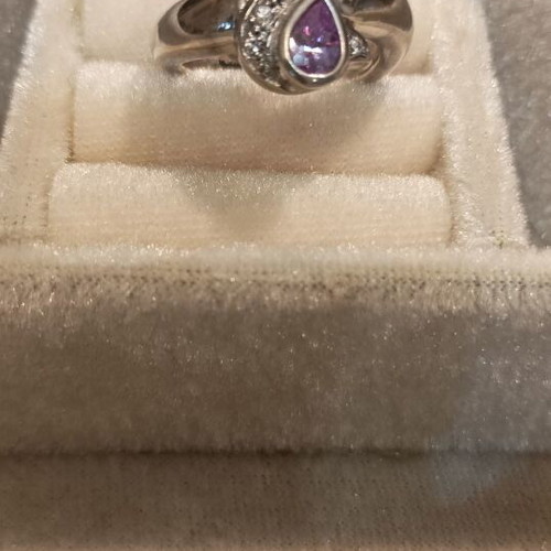 Silver ring with amethysts adjustable size, like new