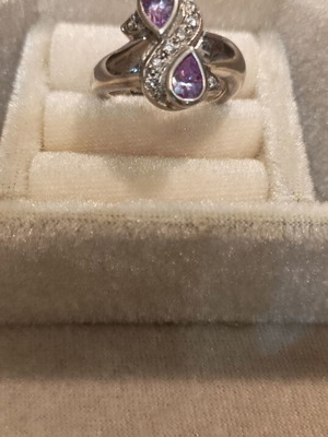 Silver ring with amethysts adjustable size, like new