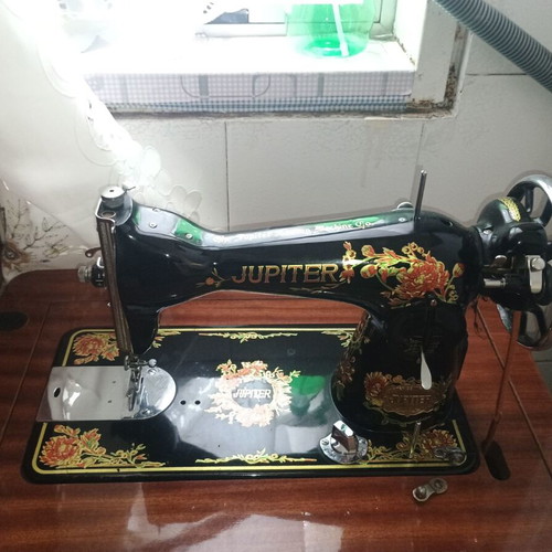 Jupiter sewing machine used, with storage cabinet