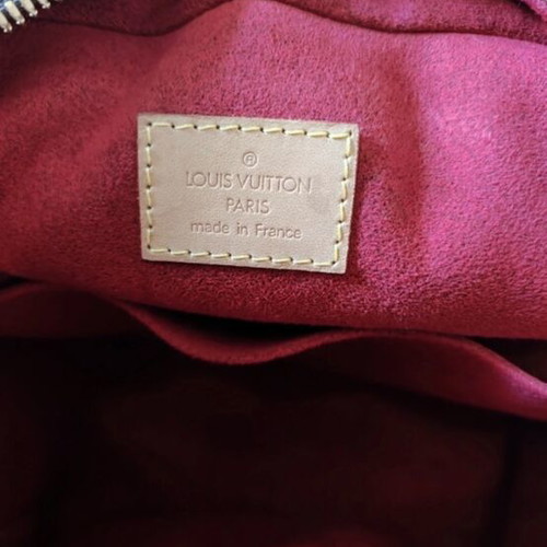 Louis Vuitton Monogram Excentri Cite handbag hand brown like new