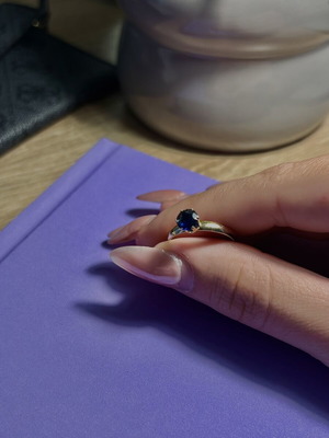 Ring dark blue with gold base like new