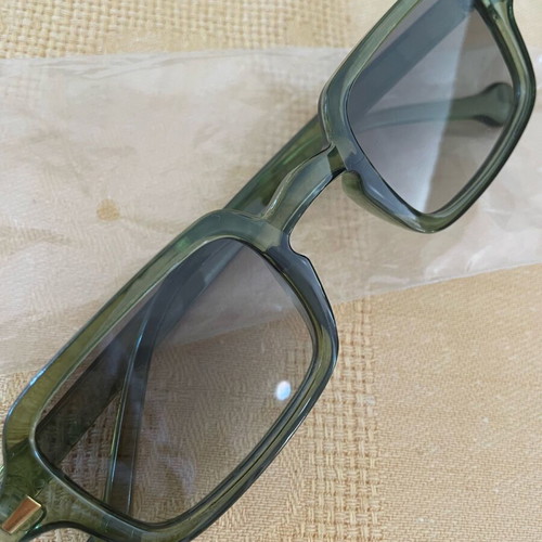 Sunglasses new in green color