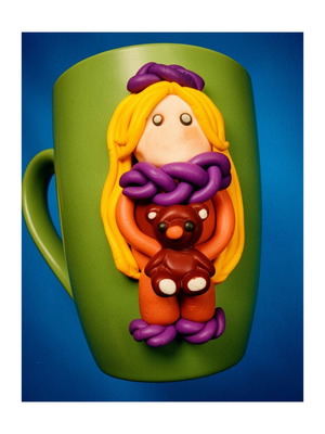 Handmade mug with girl and teddy bear