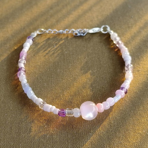 Handmade pink bracelet with silver elements