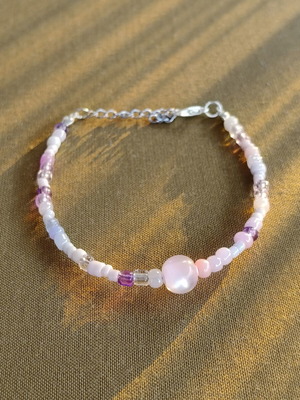 Handmade pink bracelet with silver elements