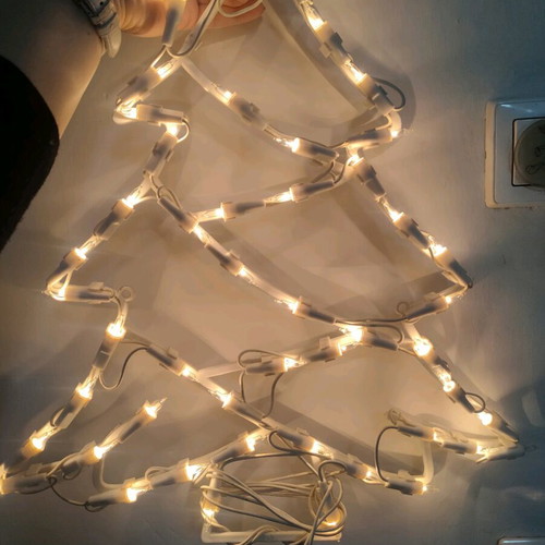 Christmas tree with lights used, one light not working