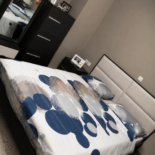 Bedroom furniture set like new with large bed, leather headboard, storage
