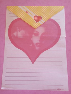 Vintage envelope and letter sheet with couple inside heart like new