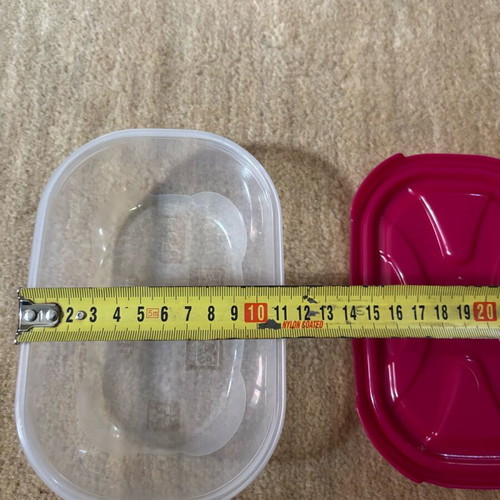 Oval food container used with fuchsia lid 20cm