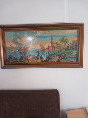 Embroidered picture used with wooden frame