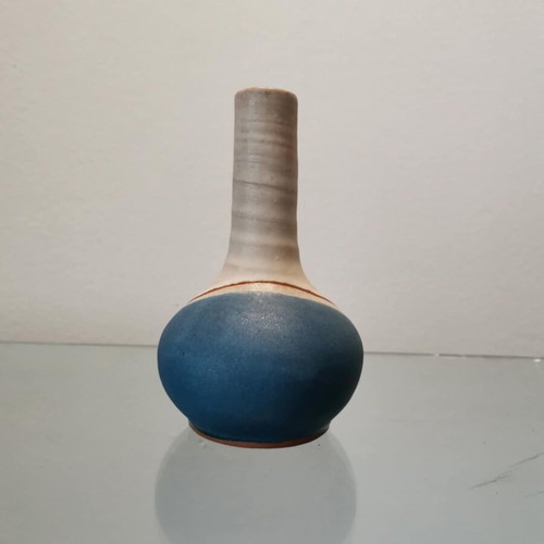 Handmade clay vase used with wavy finish