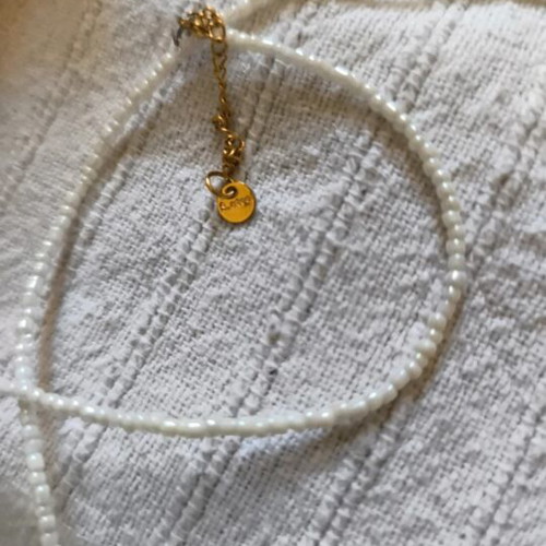 Necklace with white pearls and stainless steel chain like new