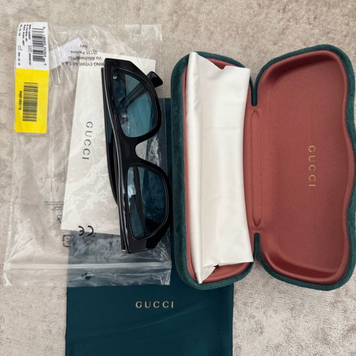 Gucci sunglasses new with acetate frame and light green lens