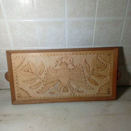 Vintage wood-carved plate like new with double-headed eagle