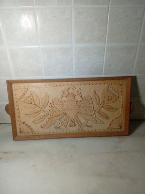 Vintage wood-carved plate like new with double-headed eagle