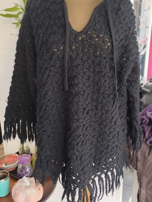 Poncho-style knit used with beautiful design