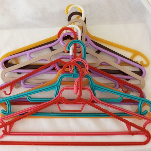 Plastic hangers used, pack of 10, large colorful