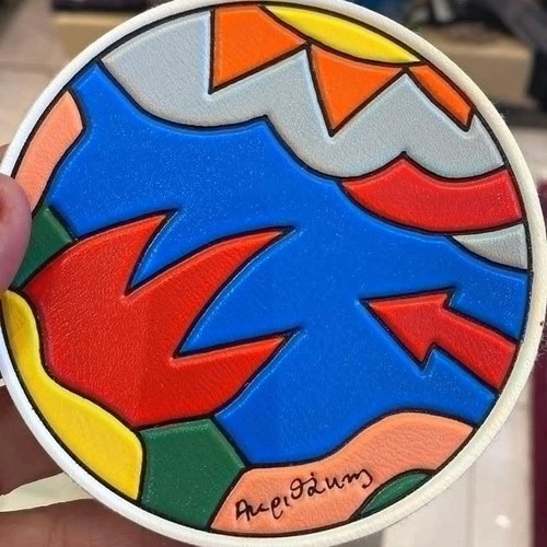 Collectible coaster with Alexis Akrithakis signature, 'Fire' design