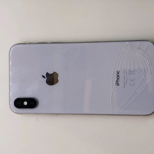 iPhone X used for parts or use, jailbroken, with charging cable