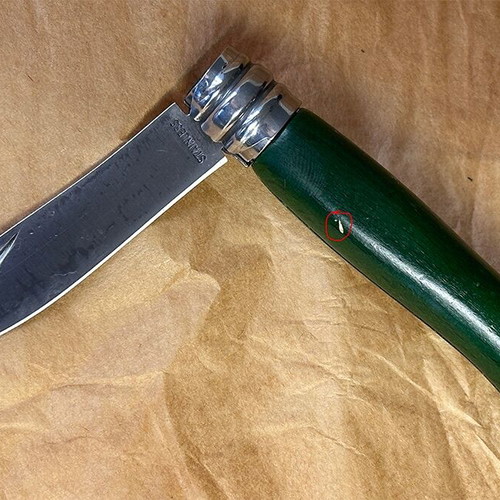 Green 7cm folding knife used with slight marks