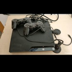 PlayStation 3 Slim μεταχειρισμένο με 2 κοντρόλ, ακουστικό και PlayStation Eye