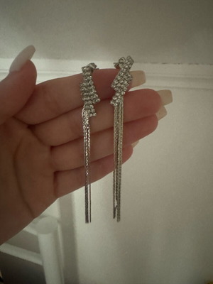 Evening silver earrings with rhinestones long