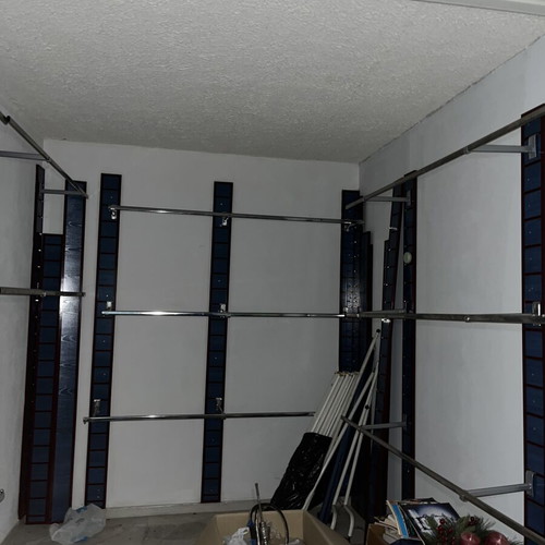 Professional Wall-Mounted Clothing Hanging System like new