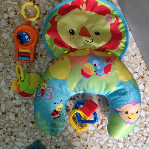 Activity Pillow for Babies like new with hanging toys