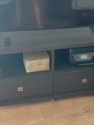 TV stand like new with two drawers and two shelves, wheels
